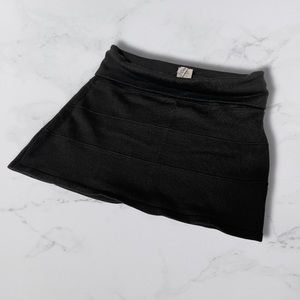 Stretchy black mini skirt for a small waist
